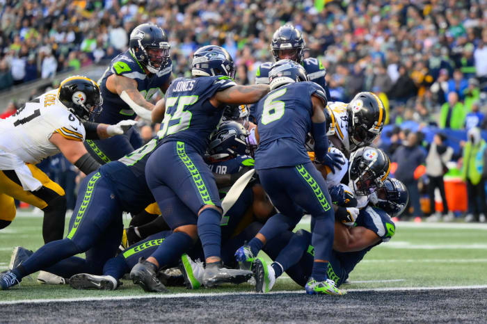Dec 31, 2023; Seattle, Washington, USA; Pittsburgh Steelers running back Najee Harris (22) carries the ball for a touchdown against the Seattle Seahawks during the second half at Lumen Field.